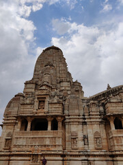 Picture of Meera temple at Chittorgarh Fort shot against blue sky and white clouds during daylight