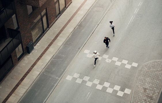 Women jogging along a city street