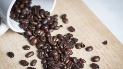 Coffee beans with spoon and glass ready to be served