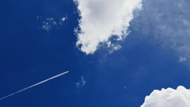 Jet contrail in the blue sky