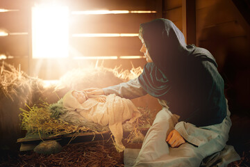 Christmas story Mary and baby Jesus in a manger