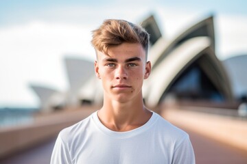 Close-up portrait photography of a content boy in his 20s wearing a cute crop top at the sydney...