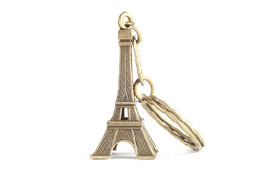 Rolgordijnen Eiffel Tower keychain isolated on white © romantiche