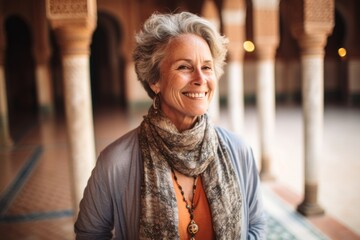 Lifestyle portrait photography of a happy mature woman wearing a dramatic choker necklace at the alhambra in granada spain. With generative AI technology