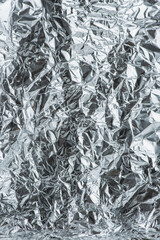 Macro texture of silver crumpled foil