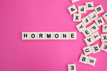 alphabet letters with the word hormone. the concept of women's disease. medical and health concepts