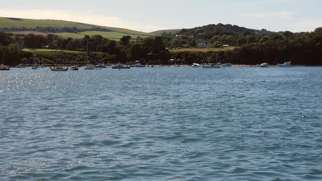 Boats moored in Studland Bay Dorset United Kingdom