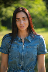 portrait of a young woman in the park