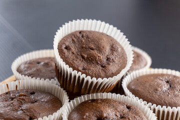 chocolate muffins on a dark background. food concept. dessert. bakery. diet