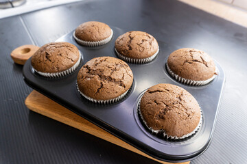 chocolate muffins on a dark background. food concept. dessert. bakery. diet