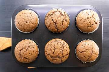 chocolate muffins on a dark background. food concept. dessert. bakery. diet