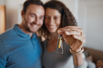 Hand, success or happy couple with house keys in real estate, property investment or buying apartment. New home blur, goal or excited man with smile or woman to celebrate moving in flat together