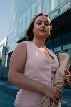 City Square Shine: Bright Day, Brighter Model in Sunglasses & Pink Dress
