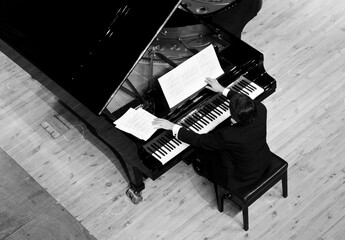 Person playing a piano