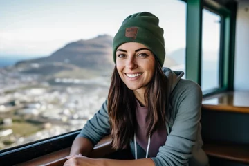 Keuken foto achterwand Tafelberg Environmental portrait photography of a joyful girl in her 30s wearing a trendy beanie at the table mountain in cape town south africa. With generative AI technology