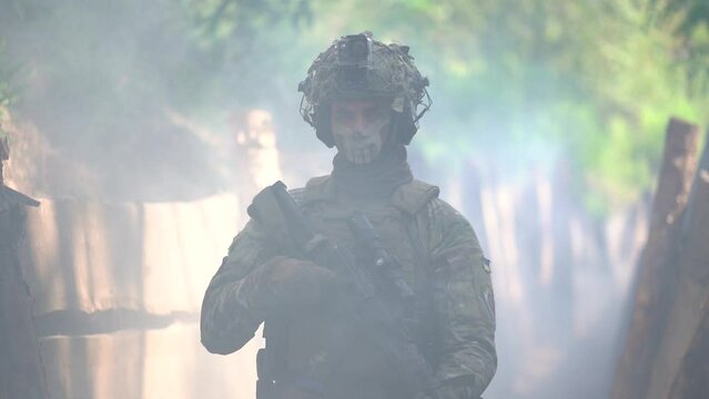 Ukraine, Warzone, August 29, 2023: Ukrainian soldiers in defensive trenches. War of Russia against Ukraine. Defensive trenches in smoke. Ukrainian soldiers during the war are preparing