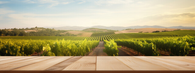 Empty wooden table on background of vineyard, in a sunny day