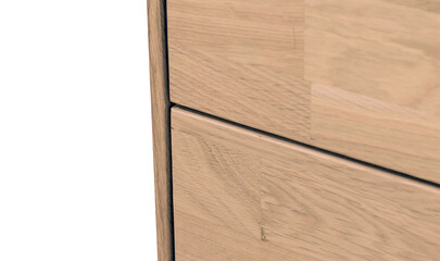Bedside table with drawers close view photo, wooden eco furniture elements background. Solid wood furniture details