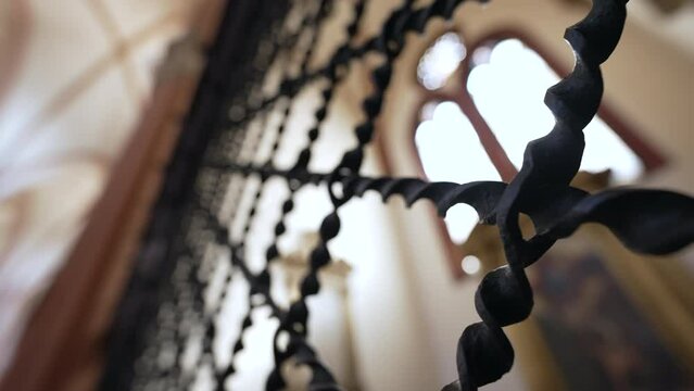 Metal patterns closeup inside Church Cathedral. Iron grid divide