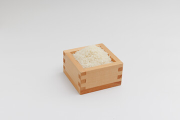 マスに入った米