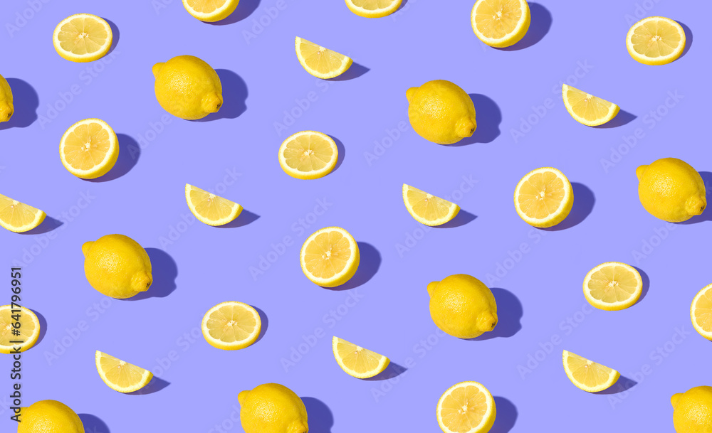 Wall mural colorful pattern of fresh ripe whole and sliced lemons - Wall murals
