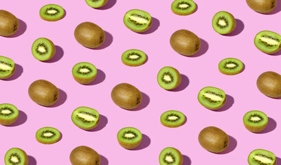 Fototapeta Colorful pattern of fresh ripe whole and sliced kiwi fruits obraz