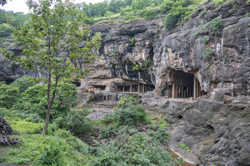 Fototapeta na wymiar The Pitalkhora Caves, in the Satmala range of the Western Ghats of Maharashtra, India, are an ancient Buddhist site consisting of 14 rock-cut cave monuments which date back to the third century BCE.