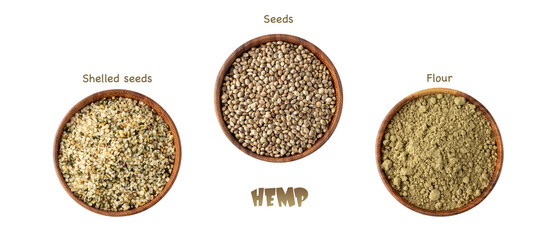 Cannabis seeds products. Shelled, whole and powder of hemp seeds in wooden bowls isolated on white...