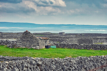 Huge maze of traditional stone fences and fields in the background. Aran Island, county Galway,...