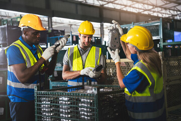 Group of Diverse Warehouse Workers Working Together to Quality Control in Factory, Industrial...
