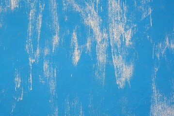 A white painted on a blue wall, abstract background for design.
