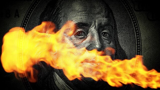 Smoothly darkening portrait of Benjamin Franklin with luminous eyes on a bill of 100 American dollars close-up with a jet of fire. The idea of a conspiracy theory. 4k conceptual slow motion loop video