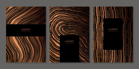 Set of templates. Luxury golden background with wood annual rings texture. Banner with tree ring pattern. Stamp of tree trunk in section. Wooden concentric circles. Black and bronze marble background - obrazy, fototapety, plakaty