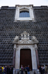 Fototapeta premium Church Chiesa del Gesù Nuovo with black facade in Italian town of Naples