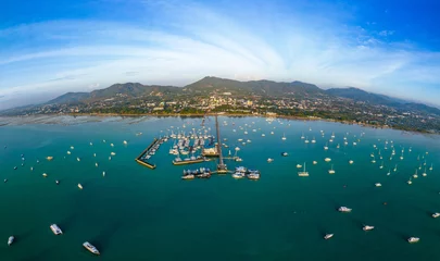 Tuinposter Aerial panorama view of Chalong pier with many boats at sunrise, Phuket, Thailand © lkunl