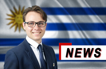 News anchor, tells the latest news, smiling, against the background of the flag of Uruguay