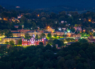 Downtown campus of West Virginia university and Woodburn hall as dusk and lights give a warm glow...