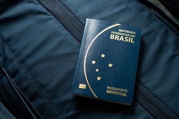 Brazilian Passport over a Suitcase