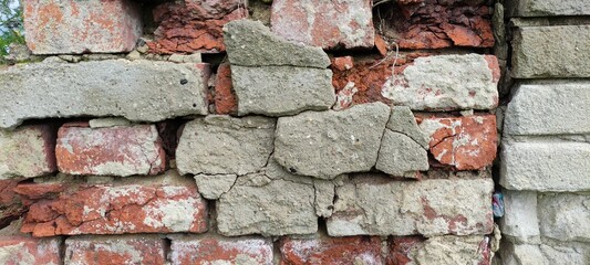 Stary mur z cegły.