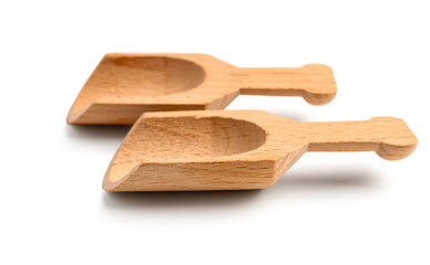 Set of wooden scoops isolated on white background