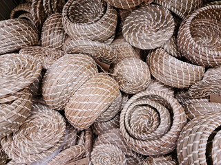 Obraz premium Straw hand woven storage baskets, Wicker boxes, Natural seagrass basket.