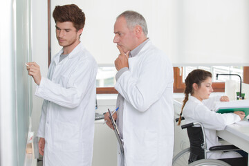 Obraz premium interns in white coat