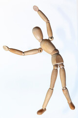 Wooden toy man on a white background