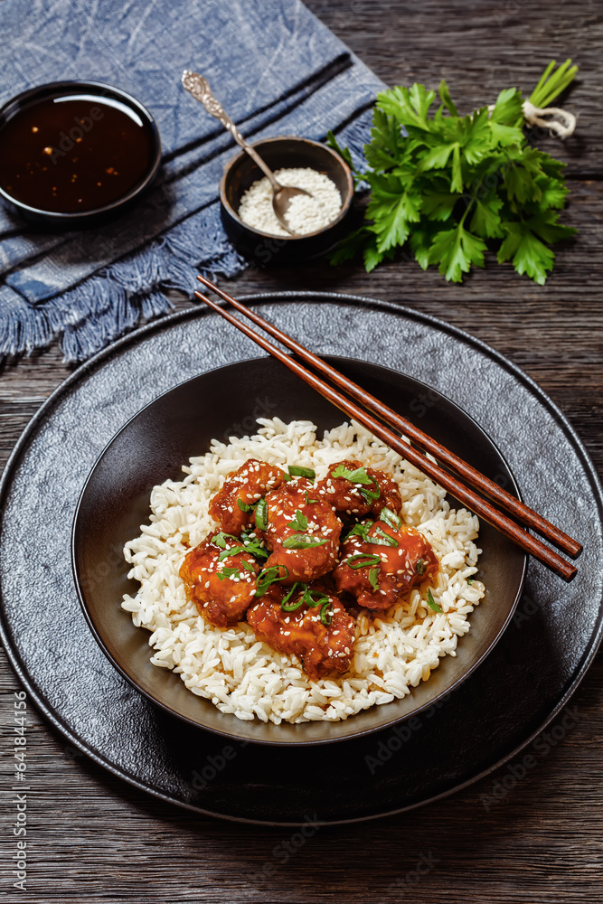 Wall mural baked honey sesame chicken with brown rice