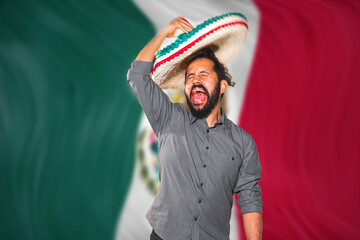 Mexicano joven bandera dia de la independencia septiembre emocionado grito - obrazy, fototapety, plakaty