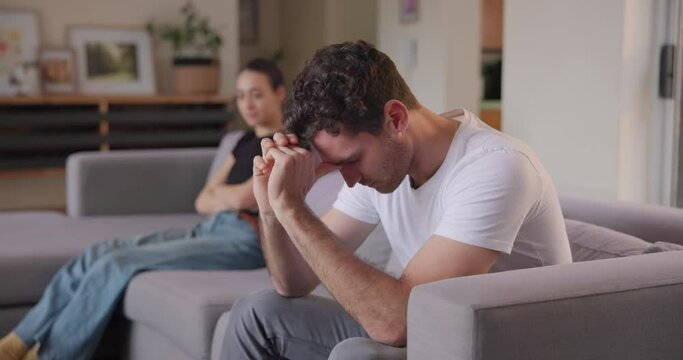Couple, stress and depression of divorce on sofa for breakup, bad argument and emotional anxiety at home. Sad man, fight and ignore partner in crisis, anger and drama of cheating, worry and jealousy