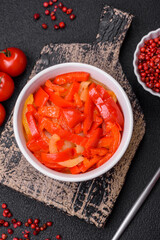 Delicious fresh saute sweet bell pepper slices with onion, salt, spices and herbs