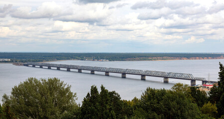 Fototapeta na wymiar Old bridge over the Volga river in Ulyanovsk, Russia