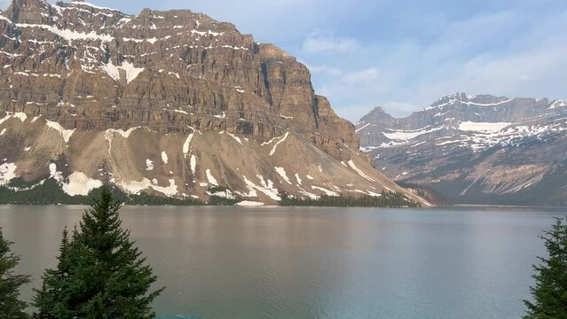 The scenic view of Hector Lake along the Icefields Parkway in Banff National Park in Canada.