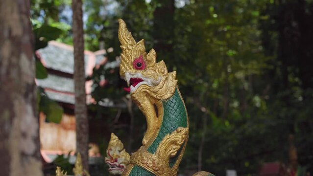 dragon statue of Wat Ruese Pa Saeng Tham temple on Koh Phangan island, thailand